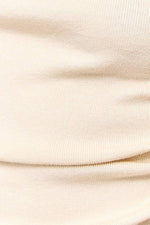 IVORY ASYMMETRICAL NECK SWEATER TOP