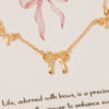 Gold Dipped Mini Ribbon Bow Station Charms Chain Necklace